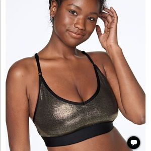 Victoria’s Secret metallic gold strappy sports bra